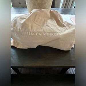 Black slouchy leather purse with tassels